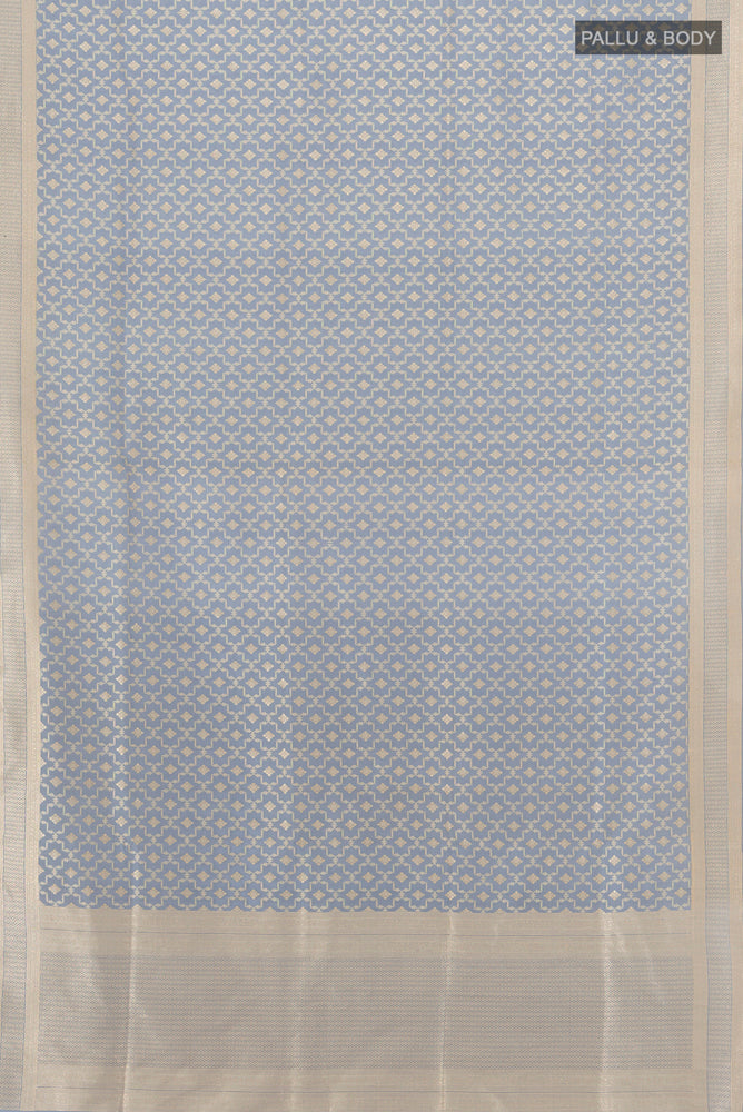 Flat view of Blue Grey Banarasi Silk Saree with Zari Butta on the body and Zari Border. 