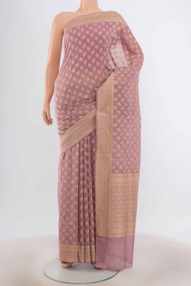 Lavender Banarasi Silk Saree with Zari Butta on the body and Zari Border.  displayed on a mannequin