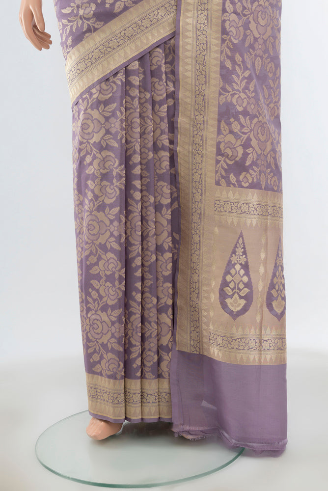 Pleats and pallu of Lavender Banarasi Silk Saree with Zari Butta on the body and Zari Border. 
