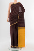 Coffee Brown Soft Silk Saree with Zari Butta on the body and Silk Border.  displayed on a mannequin