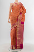 Brick Orange Soft Silk Saree with Zari Brocade on the body and Zari Border.  displayed on a mannequin