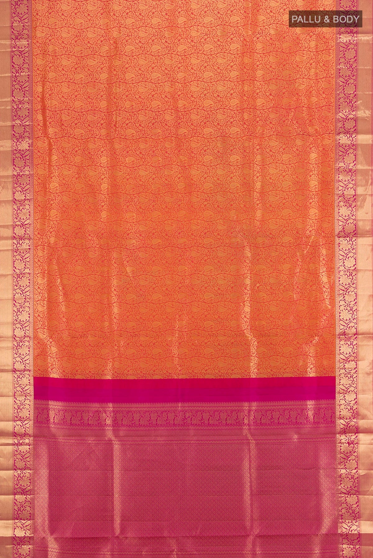 Flat view of Brick Orange Soft Silk Saree with Zari Brocade on the body and Zari Border. 