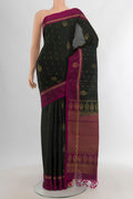 Black Soft Silk Saree with Zari Butta on the body and Plain Border.  displayed on a mannequin