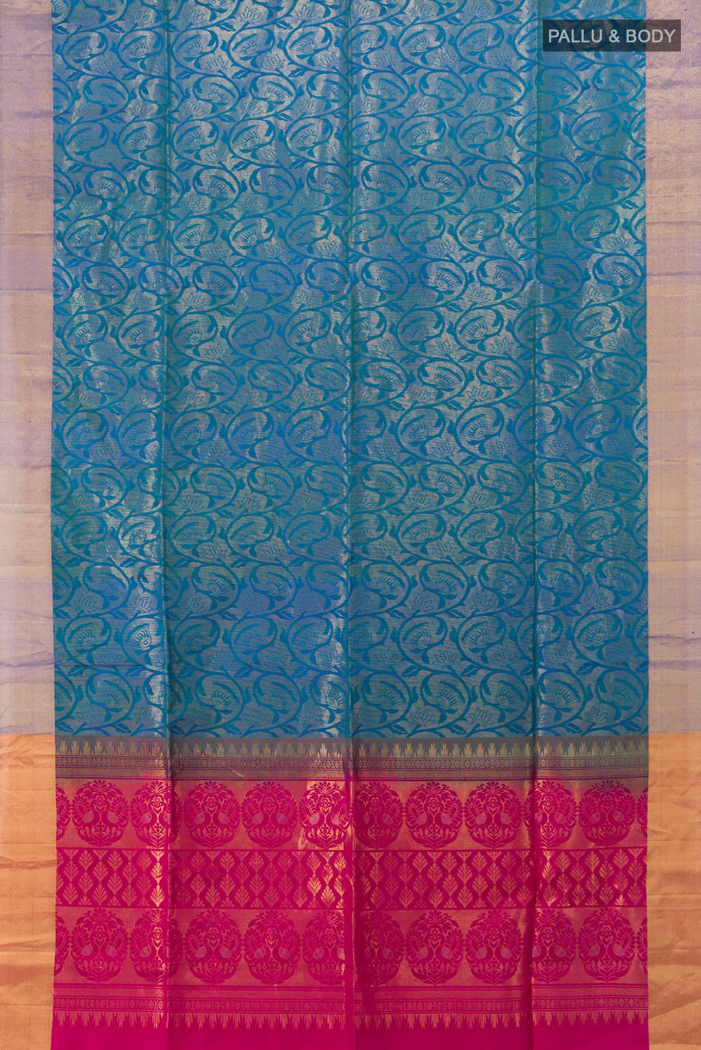 Flat view of Peacock Blue Soft Silk Saree with Zari Butta on the body and Silk Border. 