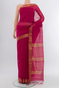 Dark Pink Maheshwari Silk Cotton Saree with Zari Butta on the body and Silk Border.  displayed on a mannequin