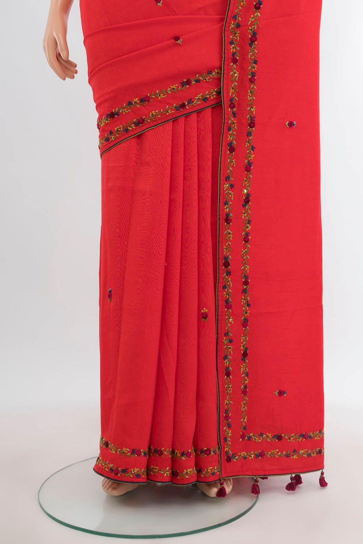 Pleats and pallu of Orange Blended Art Silk Saree with Embroidery on the body and Embroidery Border. 