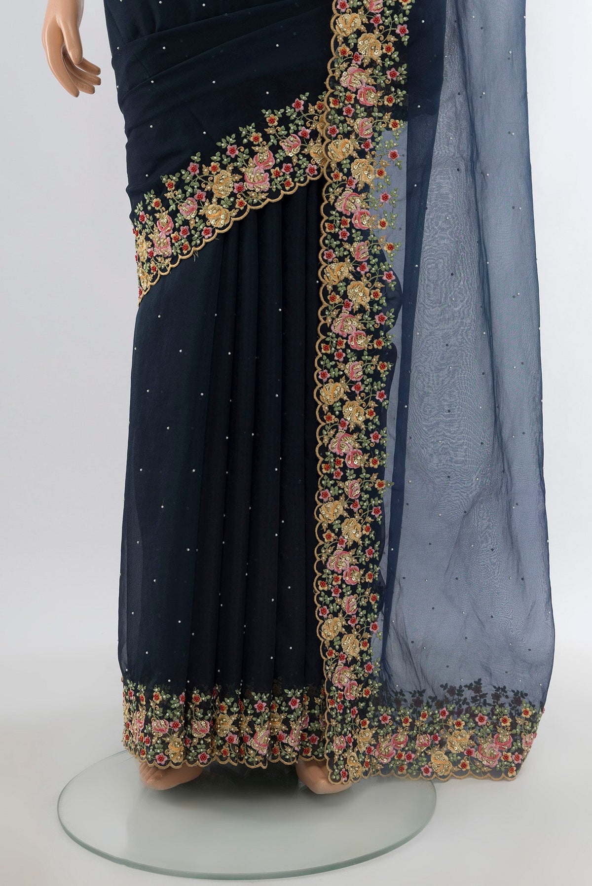 Pleats and pallu of Navy Blue Blended Embroidery Net Saree with Embroidery on the body and Embroidery Border. 