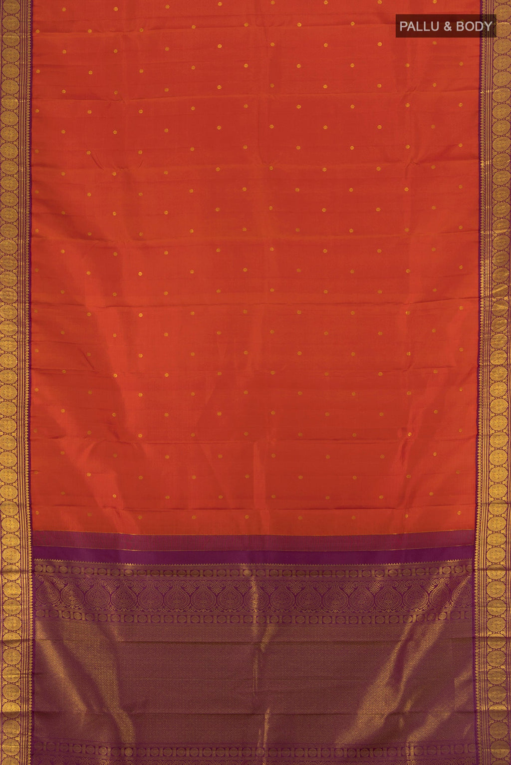 Flat view of Rust Kanjivaram Silk Saree with Zari Butta on the body and Zari Border. 