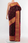Coffee Brown Kanjivaram Silk Saree with Zari Butta on the body and Silk Border.  displayed on a mannequin