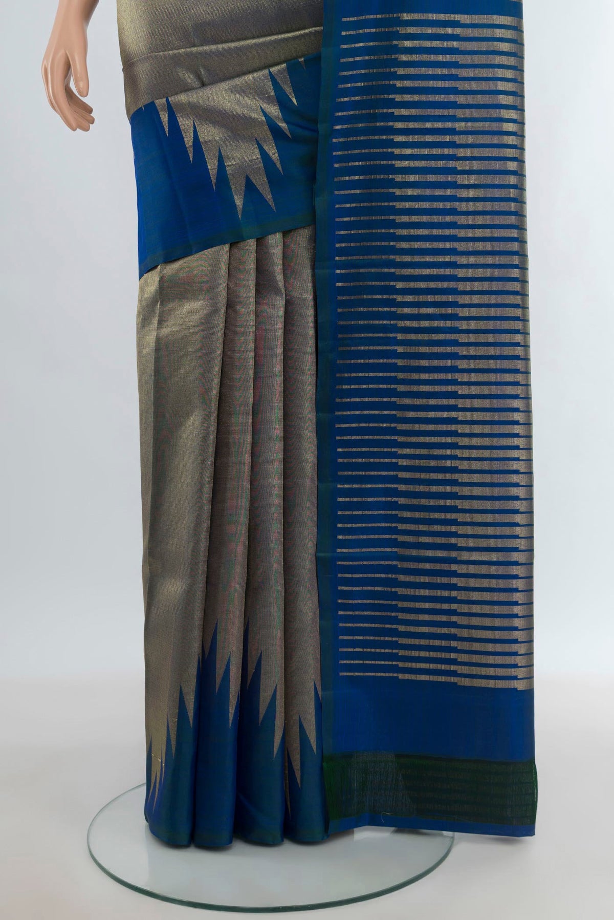 Pleats and pallu of Peacock Blue Kanjivaram Silk Saree with Zari Brocade on the body and Temple Border. 