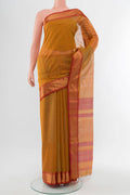 Mustard Maheshwari Silk Cotton Saree with Checked design on the body and Silk Border.  displayed on a mannequin