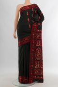 Black Baluchari Silk Saree with Thread Butta on the body and Thread Border.  displayed on a mannequin
