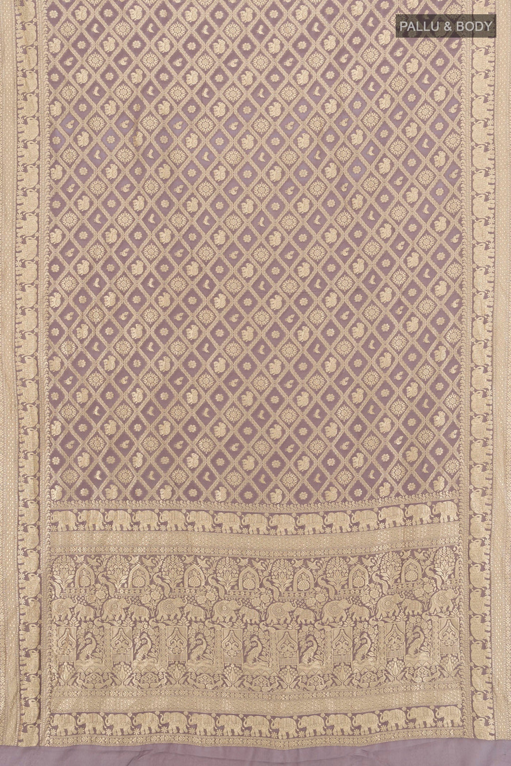 Flat view of Lavender Banarasi Georgette Saree with Zari Brocade on the body and Zari Border. 
