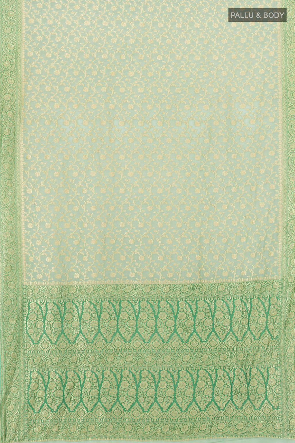 Flat view of Light Green Banarasi Georgette Saree with Zari Brocade on the body and Zari Border. 