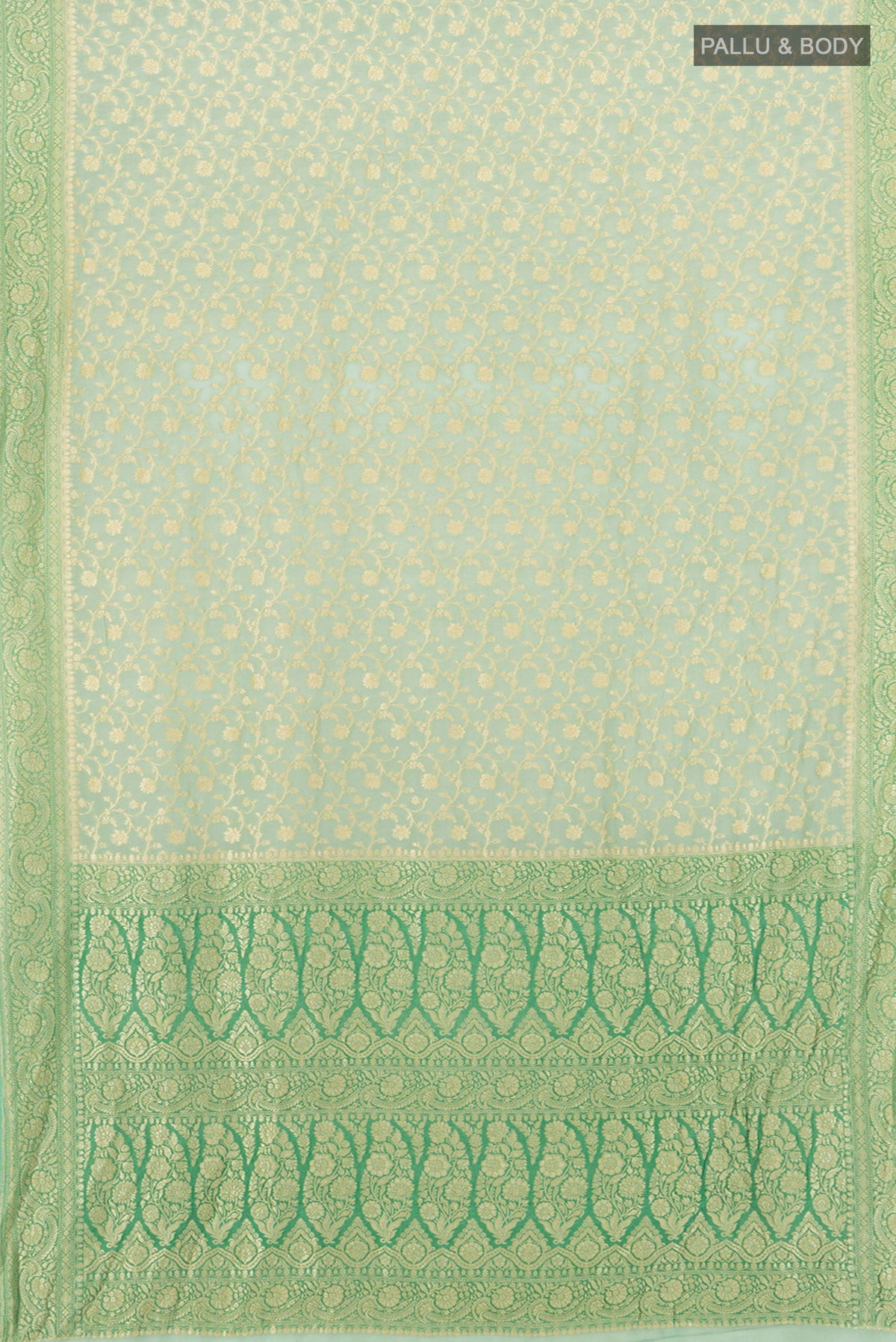 Flat view of Light Green Banarasi Georgette Saree with Zari Brocade on the body and Zari Border. 