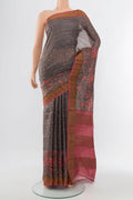 Multi Color Tussar Silk Saree with Fancy on the body and Silk Border.  displayed on a mannequin