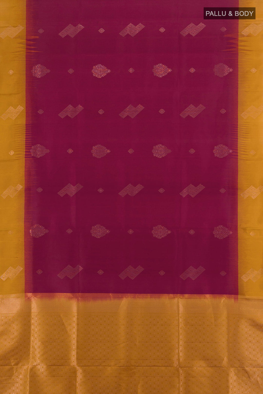 Flat view of Maroon Soft Silk Saree with Zari Butta on the body and Plain Border. 