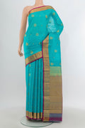 Light Blue Kanchipuram Silk Saree with Jacquard With Zari Butta on the body and Zari Border.  displayed on a mannequin