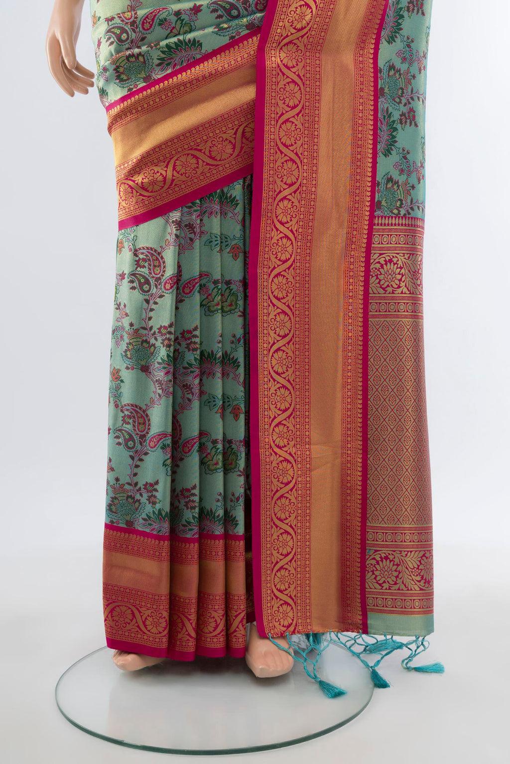 Pleats and pallu of Light Blue Art Silk Saree with Zari Butta on the body and Zari Border. 
