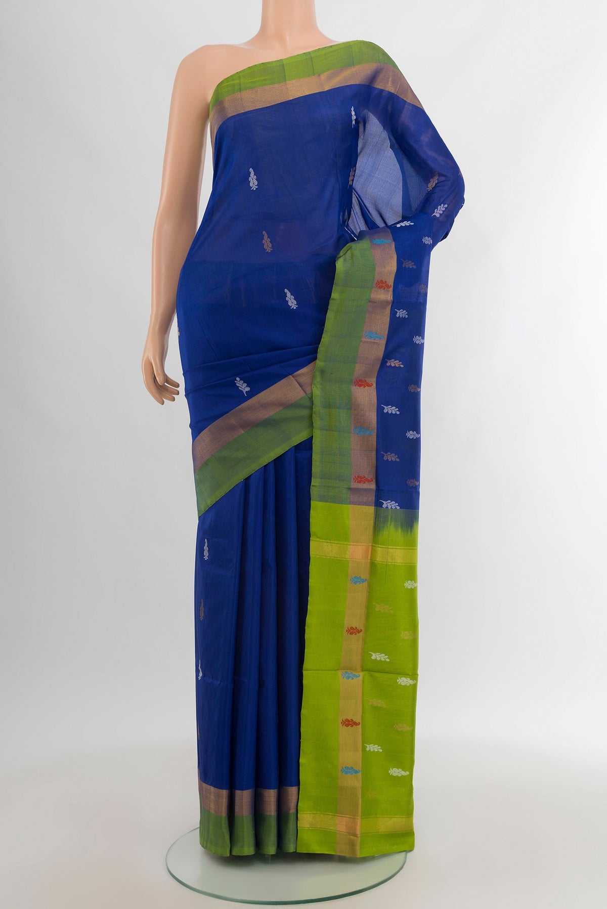 Blue Uppada Silk Saree with Zari Butta on the body and Zari Border.  displayed on a mannequin