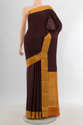 Coffee Brown Mysore Crepe Saree with Plain Body and Zari Border.  displayed on a mannequin