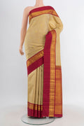 Pure Silk Pure Zari Sandal Kanchipuram Saree with Zari Butta on the body and Zari Border.  displayed on a mannequin