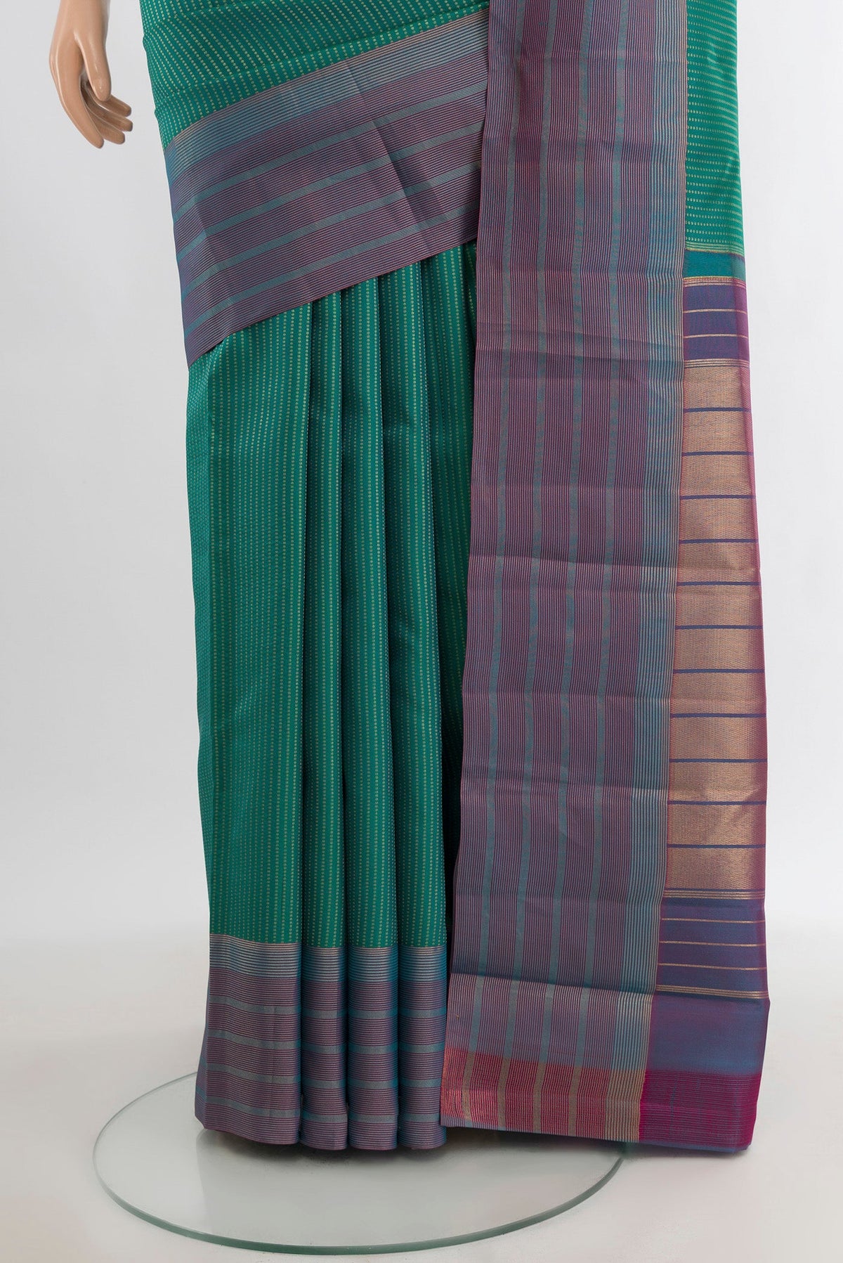 Pleats and pallu of Sea Green Kanchipuram Silk Saree with Stripes on the body and Zari Border. 