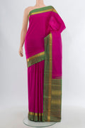 Rani Pink Kanjivaram Silk Saree with Plain Body and Zari Border.  displayed on a mannequin