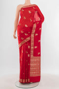 Red Banarasi Raw Silk Saree with Zari Butta on the body and Zari Border.  displayed on a mannequin