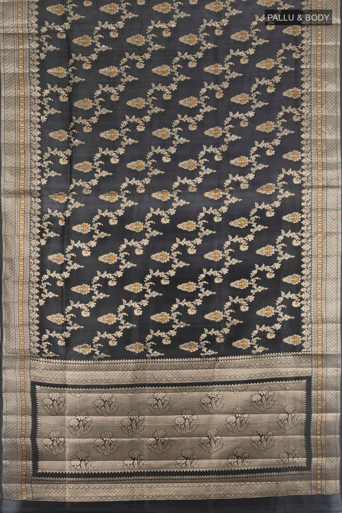 Flat view of Black Banarasi Raw Silk Saree with Zari And Thread Butta on the body and Zari Border. 
