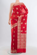 Red Banarasi Raw Silk Saree with Zari Butta on the body and Zari Border.  displayed on a mannequin