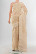 Cream Banarasi Kora Silk Saree with Zari And Thread Butta on the body and Zari Border.  displayed on a mannequin
