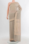 Davys Grey Banarasi Silk Saree with Zari Butta on the body and Zari Border.  displayed on a mannequin