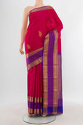 Dark Pink Kanchipuram Silk Saree with Zari Butta on the body and Zari Border.  displayed on a mannequin