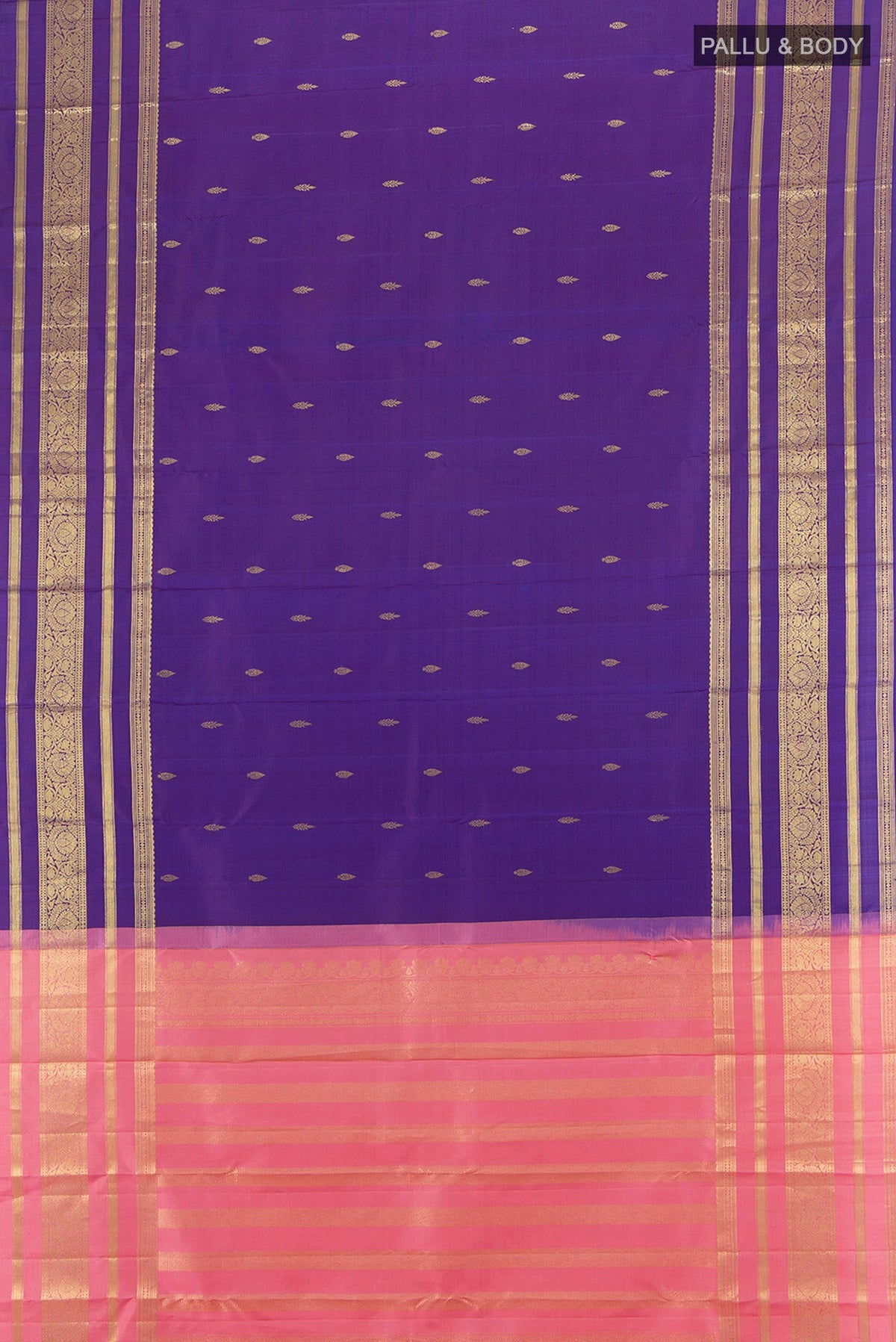 Flat view of Violet Kanchipuram Silk Saree with Zari Butta on the body and Zari Border. 