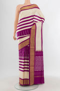 White Pochampally Silk Saree with Ikat design on the body and Zari Border.  displayed on a mannequin