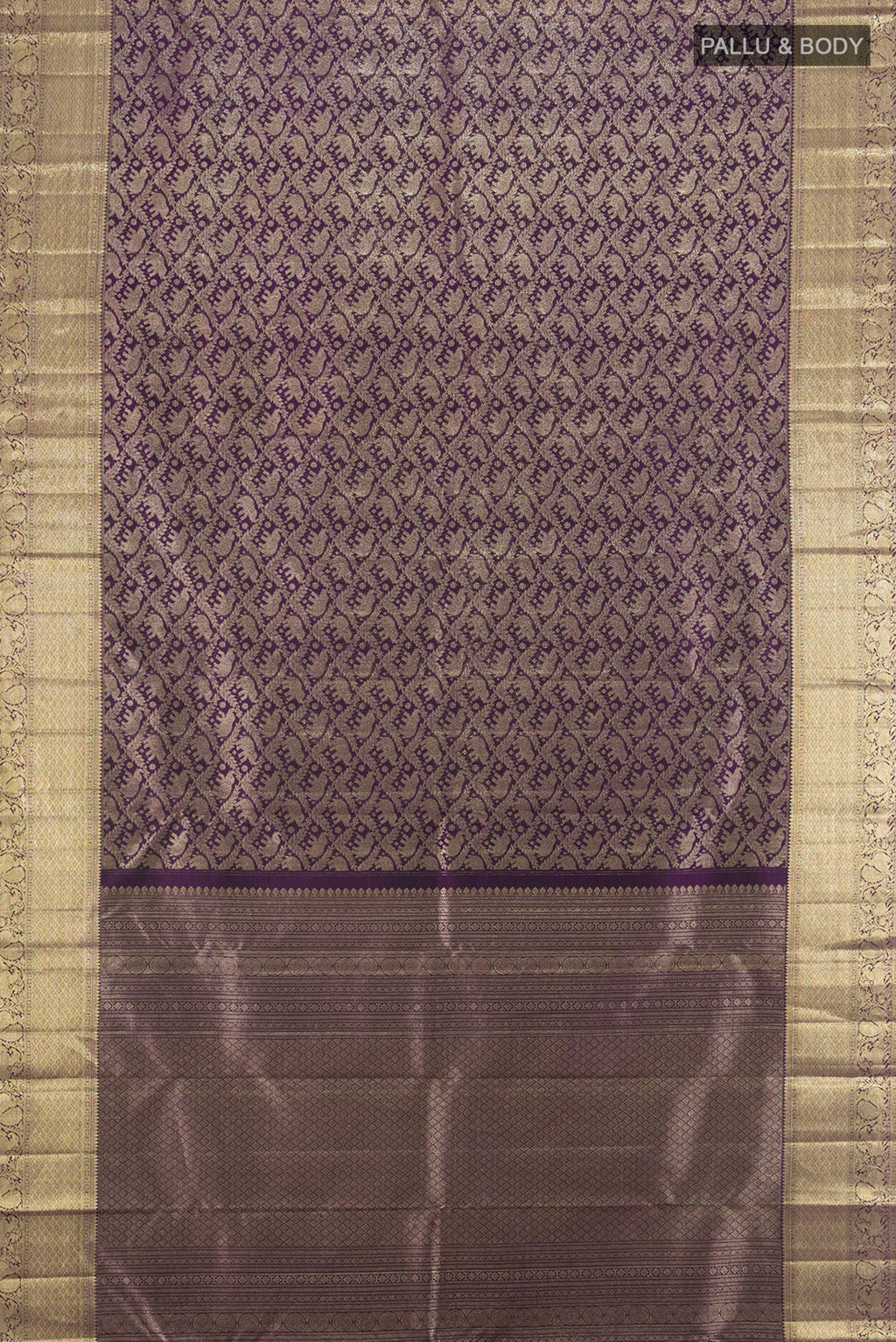 Flat view of Violet Kanchipuram Silk Saree with Zari Brocade on the body and Zari Border. 