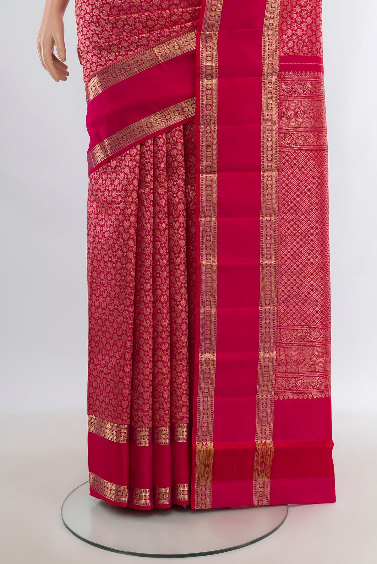 Pleats and pallu of Dark Pink Kanchipuram Silk Saree with Zari Brocade on the body and Zari Border. 