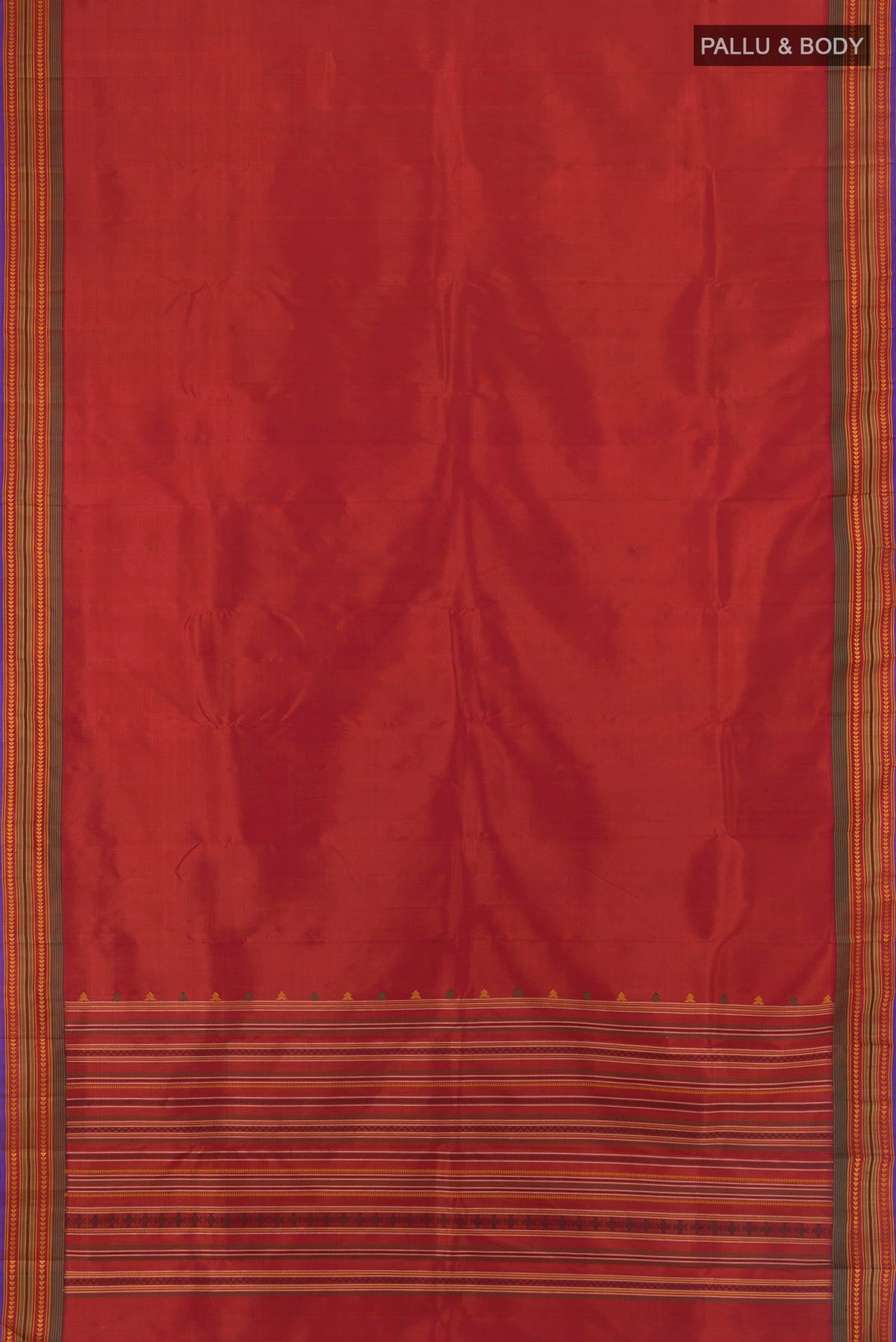 Flat view of Rust Kanchipuram Silk Saree with Plain Body and Thread Border. 