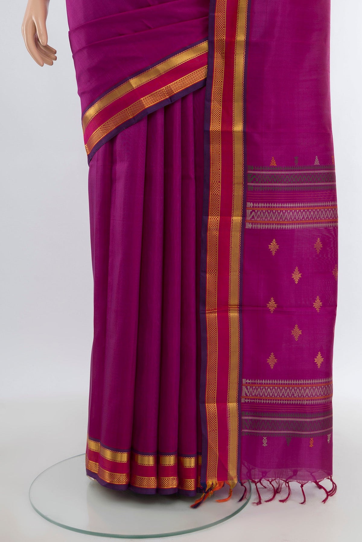 Pleats and pallu of Purple Kanchipuram Silk Saree with Plain Body and Zari Border. 