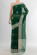 Bottle Green Chanderi Silk Cotton Saree with Zari Butta on the body and Zari Border.  displayed on a mannequin