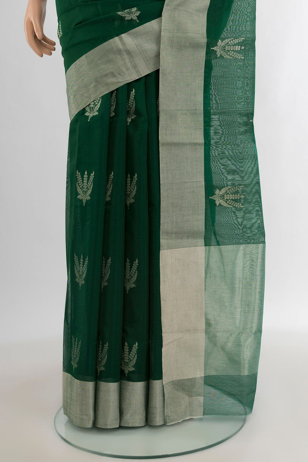 Pleats and pallu of Bottle Green Chanderi Silk Cotton Saree with Zari Butta on the body and Zari Border. 