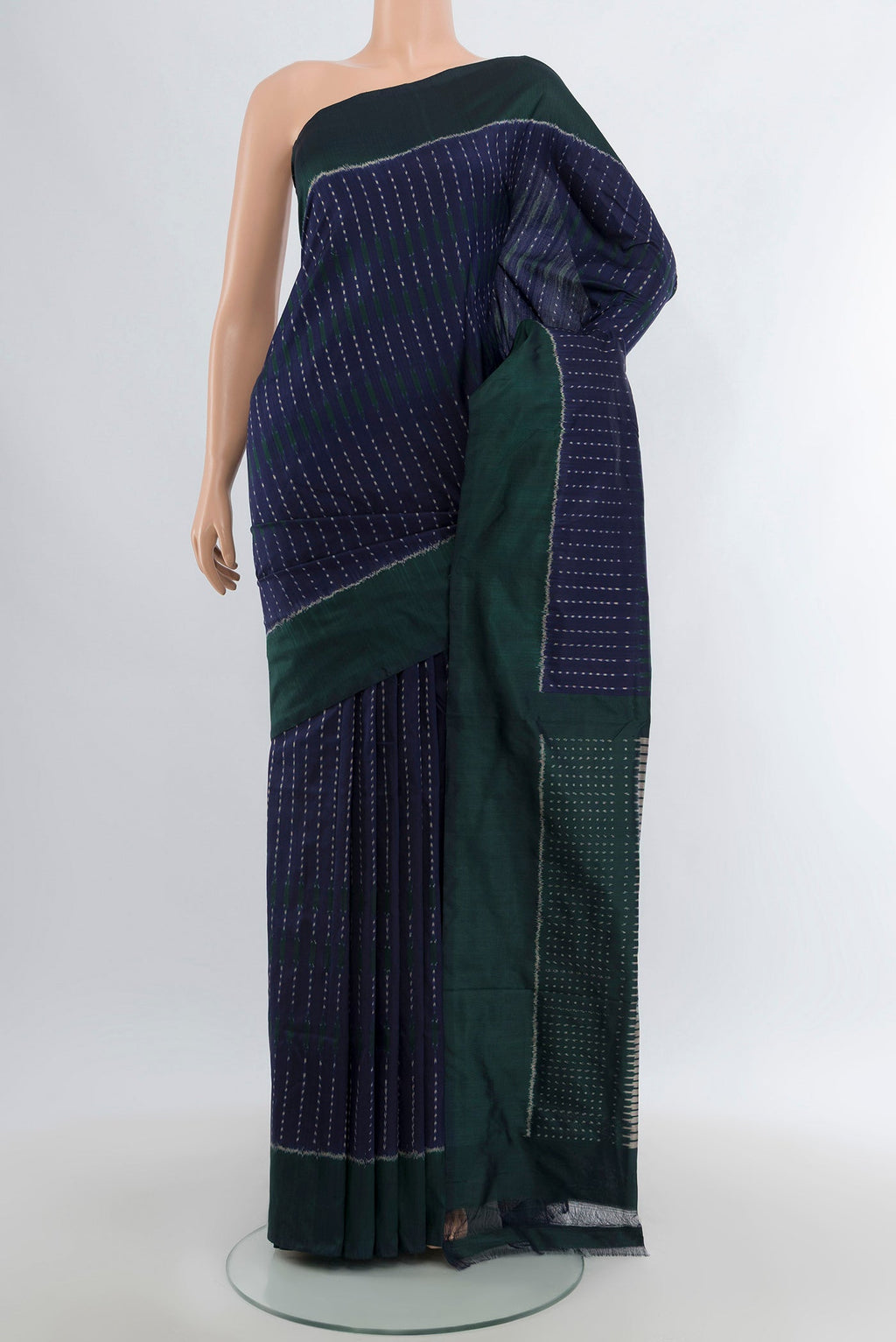 Navy Blue Pochampally Silk Saree with Pure Ikat on the body and Plain Border.  displayed on a mannequin