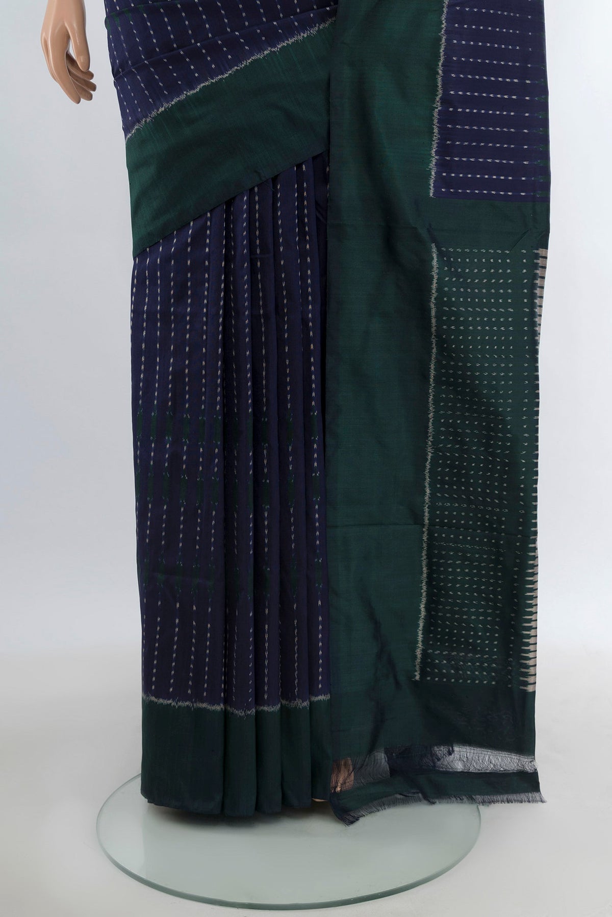Pleats and pallu of Navy Blue Pochampally Silk Saree with Pure Ikat on the body and Plain Border. 