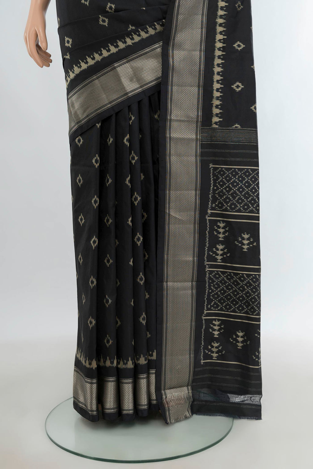 Pleats and pallu of Black Pochampally Silk Saree with Pure Ikat on the body and Zari Border. 