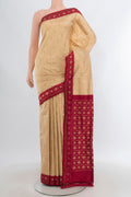 Sandal Pochampally Silk Saree with Pure Ikat on the body and Ikat Border.  displayed on a mannequin