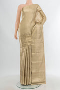 Beige Kanjivaram Tissue Silk Saree with Zari Brocade on the body and Zari Border.  displayed on a mannequin