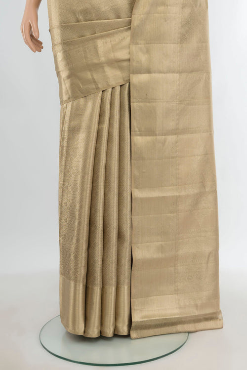Pleats and pallu of Beige Kanjivaram Tissue Silk Saree with Zari Brocade on the body and Zari Border. 