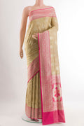 Beige Banarasi Silk Saree with Zari Brocade on the body and Zari Border.  displayed on a mannequin