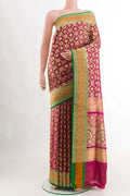 Pink Dual Tone Banarasi Tanchoi Silk Saree with Zari Brocade on the body and Zari Border displayed on a mannequin